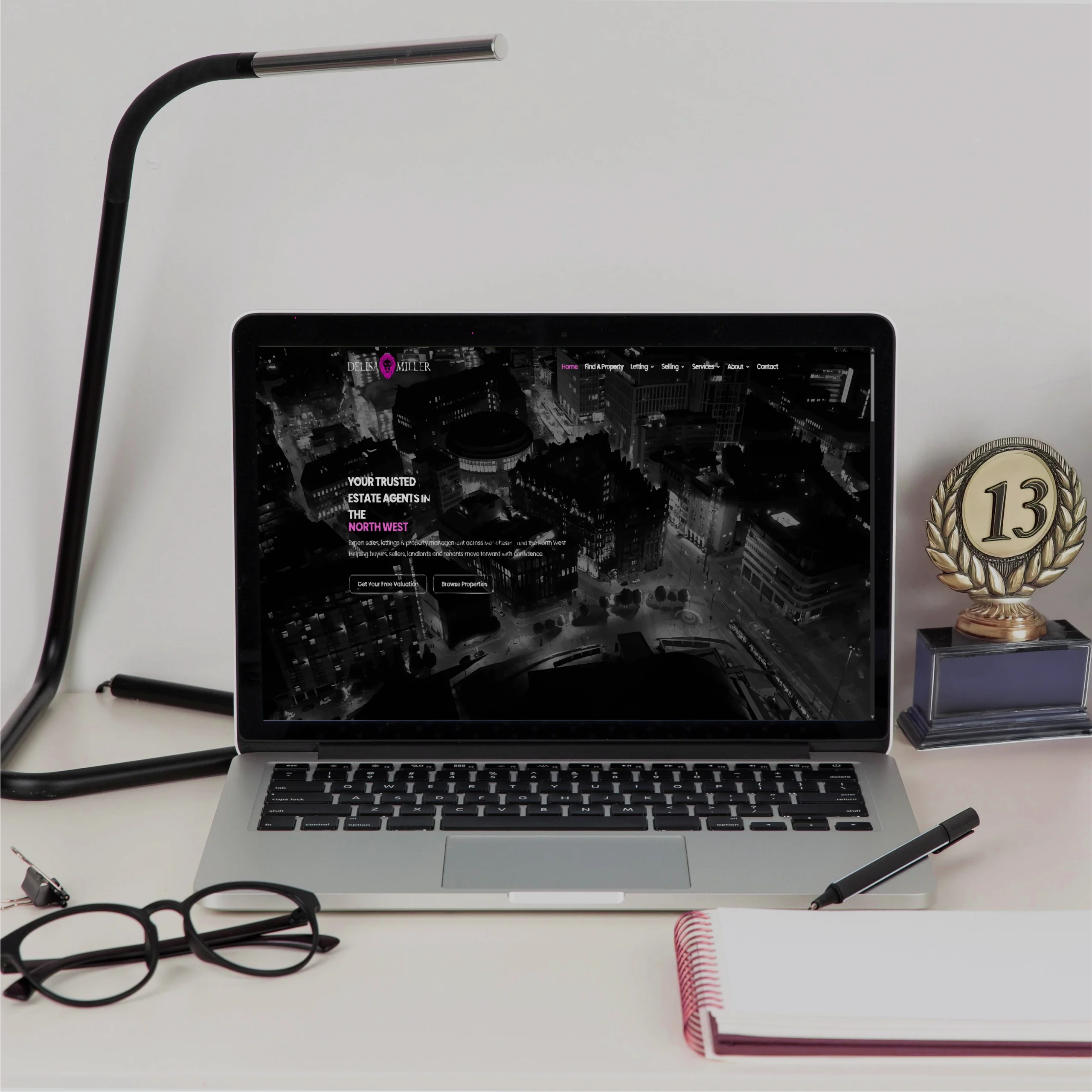 Laptop displaying online property marketing campaign for new developments by Delisa Miller in Manchester.